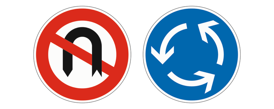 Links das amtliche Zeichen Verbot des Wendens, rechts das amtliche Zeichen Kreisverkehr.