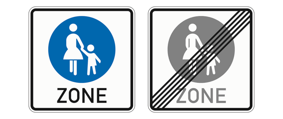 Zwei rechteckige Schilder mit Fußgängersymbol und ZONE, das rechte grau und durchgestrichen.