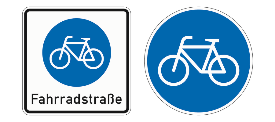 Links das rechteckige Zeichen Beginn einer Fahrradstraße, rechts das runde blaue Zeichen Radweg