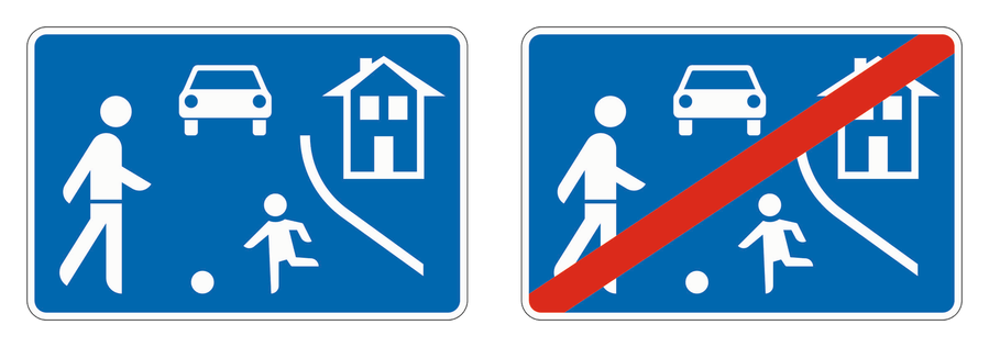 Die Zeichen „Beginn eines verkehrsberuhigten Bereichs“ und „Ende eines verkehrsberuhigten Bereichs“ nebeneinander