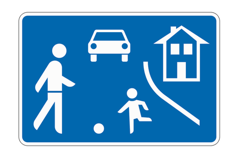 Blaues Schild mit Haus, Auto, Fußgänger und spielendem Kind.